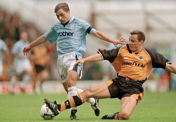 Georgi Kinkladze in action for Manchester City