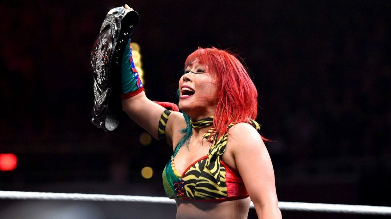 Asuka winning the belt