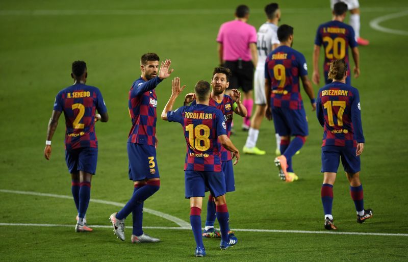 Barcelona players celebrate with Messi after his sumptuous strike doubled their lead on a tricky evening