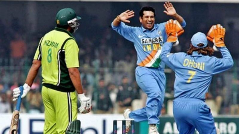 Inzamam-ul-Haq, Sachin Tendulkar and MS Dhoni during an ODI between India and Pakistan