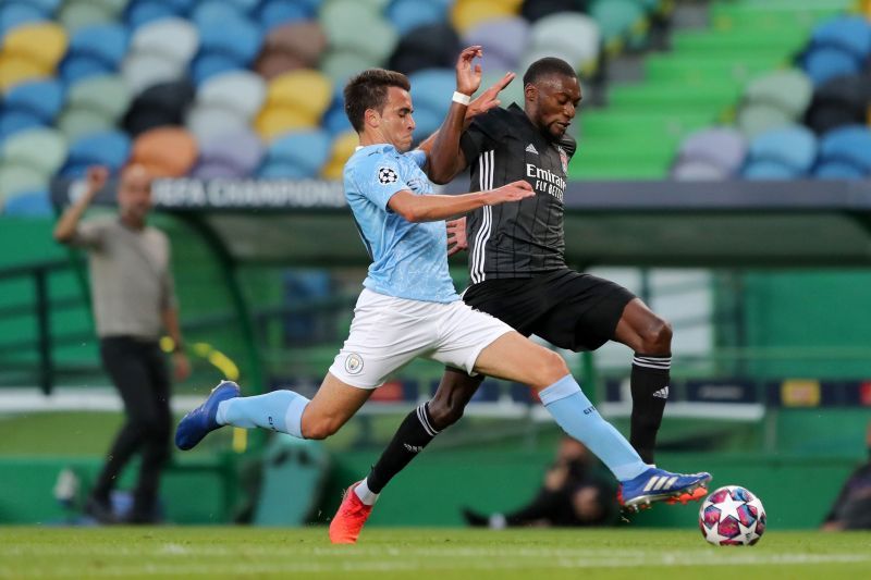 Karl Toko Ekambi being challenged by Eric Garcia