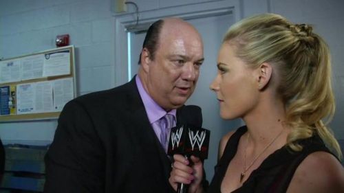 Paul Heyman and Renee Young.