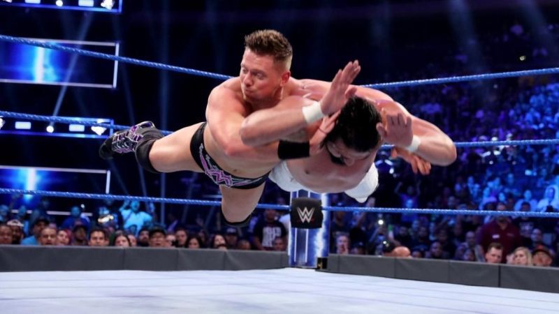 The Miz planting Andrade with the Skull Crushing Finale