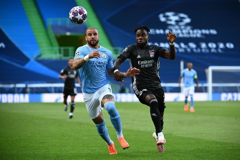 Maxwel Cornet and Kyle Walker battle for possession