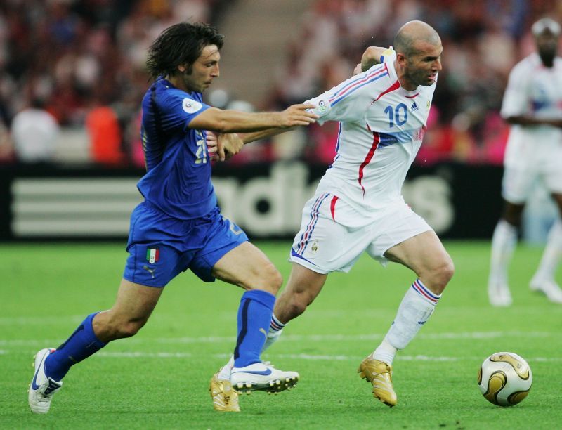 Zinedine Zidane pushes the ball past Andrea Pirlo during the 2006 FIFA World Cup final