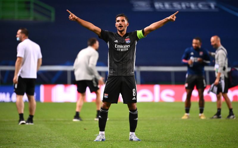 Houssem Aouar celebrates a victory for Lyon