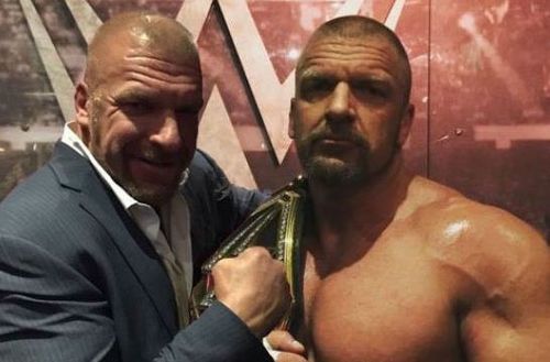 WWE backstage authority Triple H jokingly stood next to his own figure 