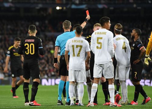 Sergio Ramos is shown a red card during the first leg match between Real Madrid and Manchester City 