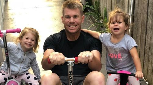 David Warner with his two daughters