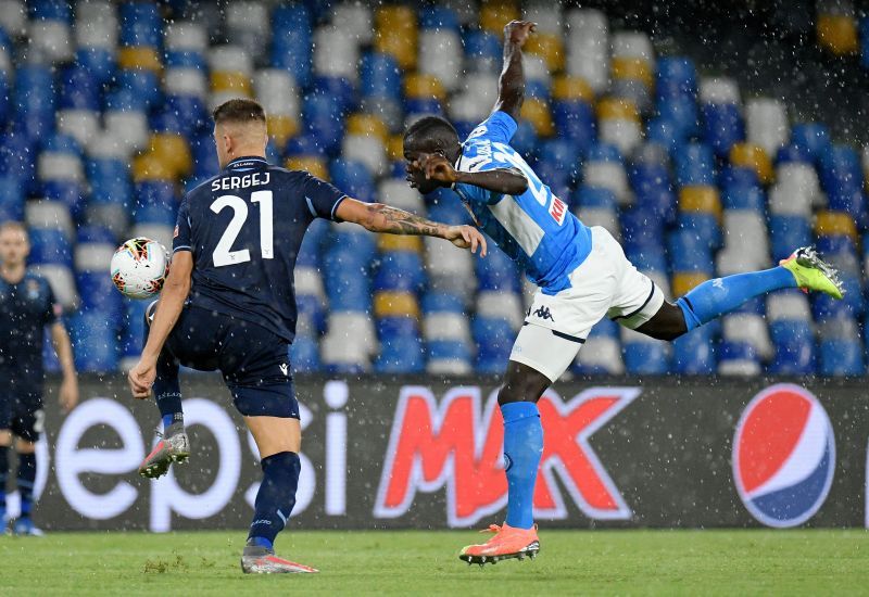 Sergej Milinkovic Savic of SS Lazio compete for the ball with Kalidou Koulibaly