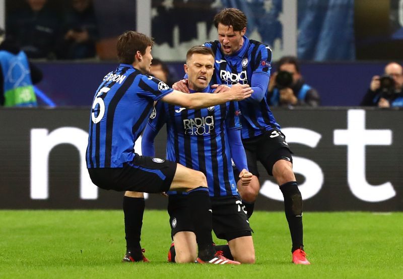 Marten De Roon (left) and Hateboer (right) celebrates with Ilicic (centre) who won&#039;t be available for the game
