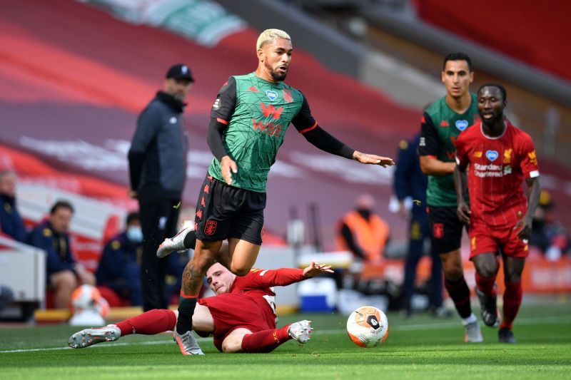 &nbsp;Douglas Luiz of Aston Villa is fouled by Andy Robertson of Liverpool.