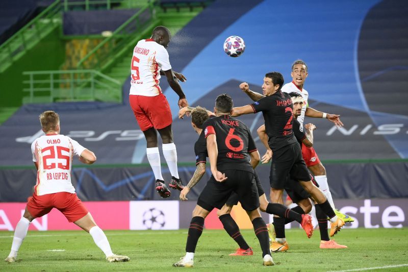 Dayot Upamecano directs a header on target