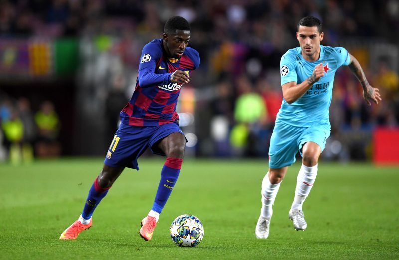 Ousmane Dembele of FC Barcelona is closed down by Nicolae Stanciu of Slavia Praha