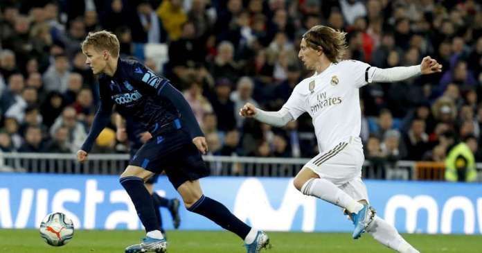 Luka Modric (right) and Martin Odegaard  