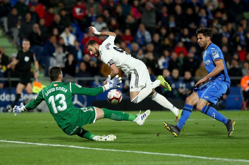 David Soria saves for a Karim Benzema shot