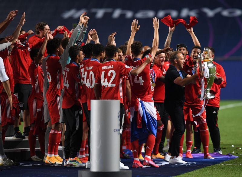 Hansi Flick - initially viewed as a temporary fix - celebrates with the Bayern players after their UCL win