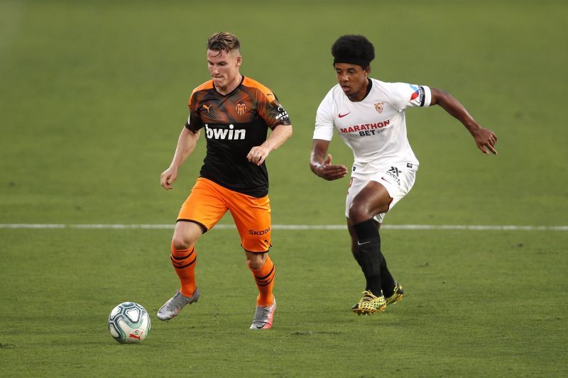 Jules Kounde (R) has had a breakthrough season in Seville