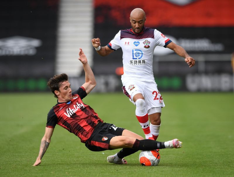 Harry Wilson of AFC Bournemouth tackles Nathan Redmond of Southampton in the Premier League