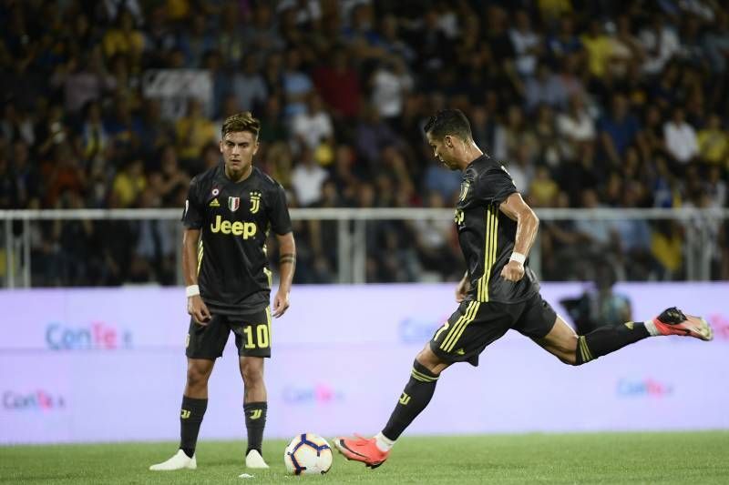 Cristiano Ronaldo (right) and Paulo Dybala are Juventus&#039; two biggest threats from set pieces. However, Dybala is a doubtful starter against Lyon.