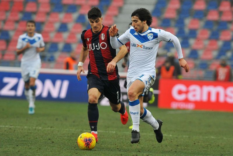 Sandro Tonali (right) with the ball