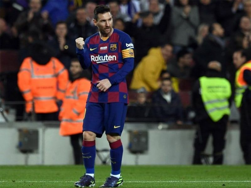 Lionel Messi exults after scoring one of three goals against Mallorca.