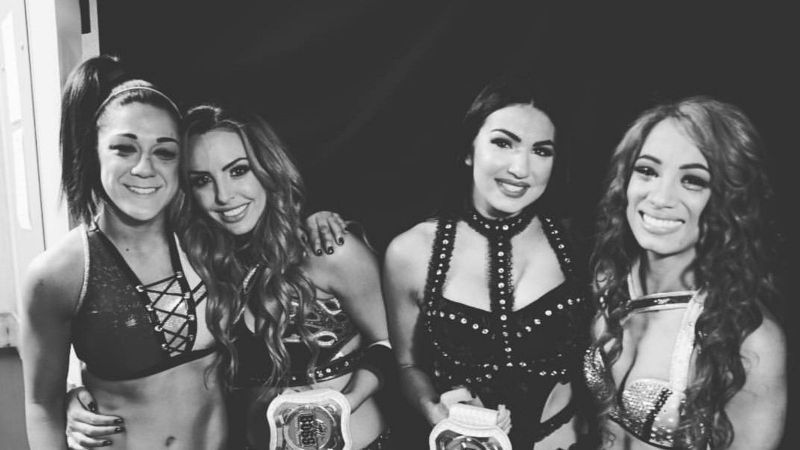 The IIconics, Sasha Banks and Bayley backstage at WrestleMania last year