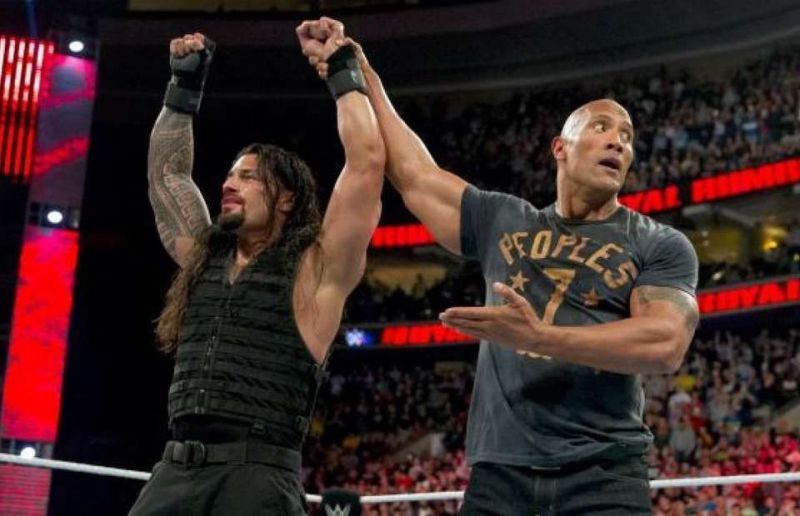 The Rock versus Roman Reigns. Who wins?