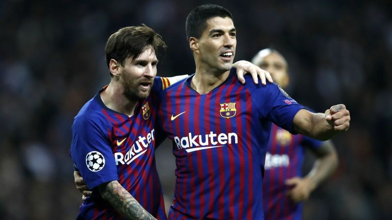 Lionel Messi (left) and Luis Suarez (right) in happier times.