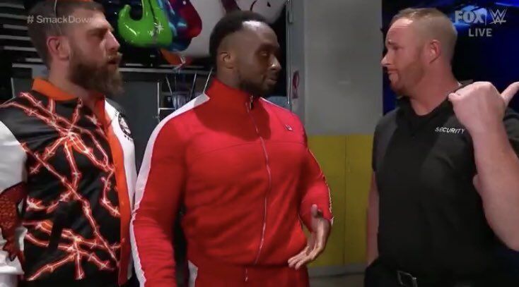 Big E and Drew Gulak with the security guard who helped to lure Big E out and get attacked by Sheamus on WWE SmackDown