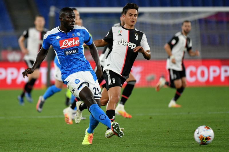 Paulo Dybala (right) of Juventus competes for the ball with Kalidou Koulibaly (left) of SSC Napoli.