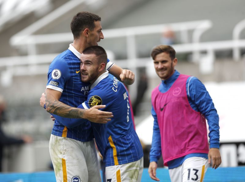 Aaron Connolly of Brighton celebrates with teammates after scoring his team's first goal against Newcastle