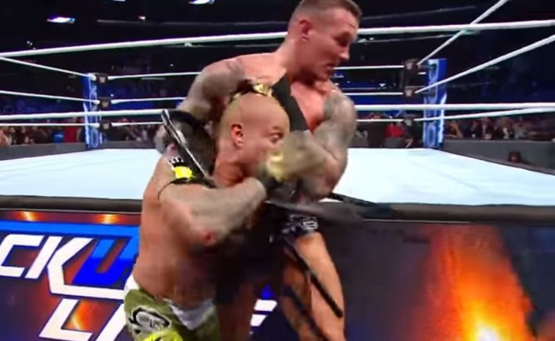 Rey Mysterio unmasked by Randy Orton