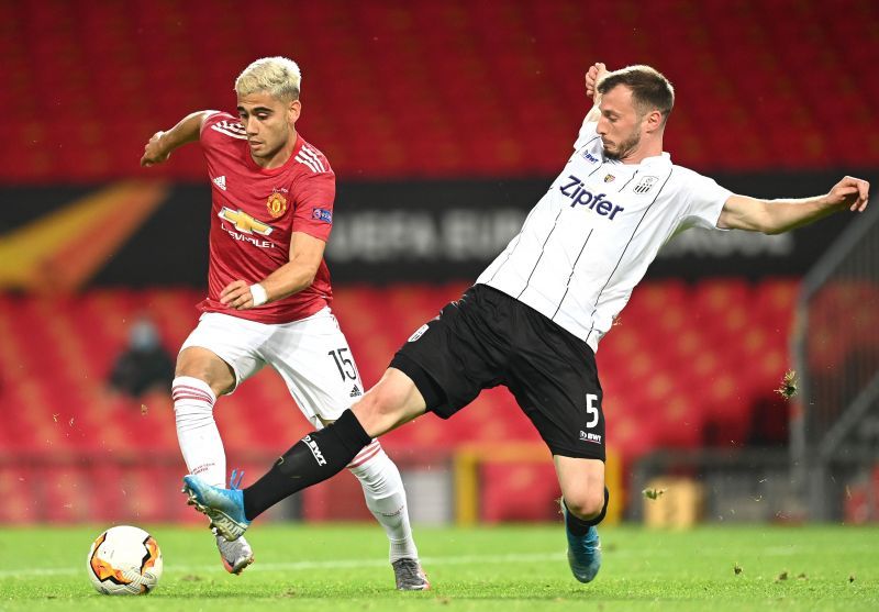 Pereira (left) in action for Manchester United