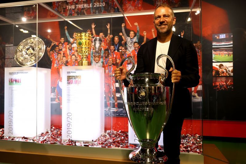 Hans-Dieter Flick Hands Over UEFA Champions League Trophy To FCB Museum