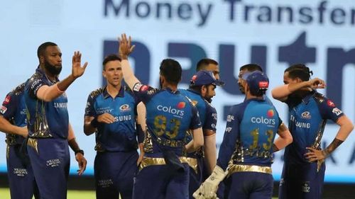 Mumbai Indians' team celebrates after picking a wicket. (Image courtesy: Hindustan Times)