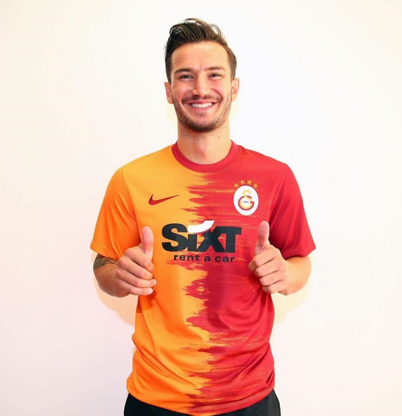 Ogulcan Caglayan modelling Galatasray Home Kit