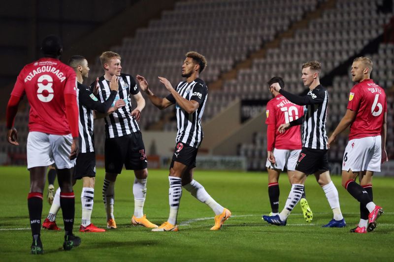 Struggling Newcastle United striker Joelinton scored twice in the 7-0 thrashing of Morecambe in the League Cup