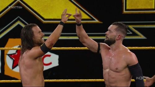 Adam Cole and Finn Balor