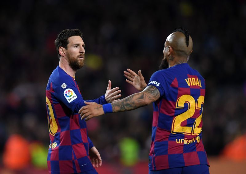 Lionel Messi and Arturo Vidal