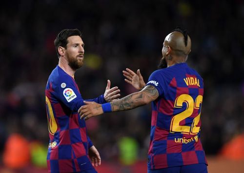 Lionel Messi and Arturo Vidal