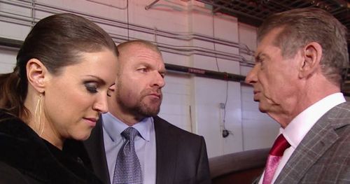 Stephanie McMahon, Triple H and Vince McMahon.