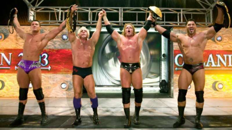 Left to right: Randy Orton, Ric Flair, Triple H, Batista