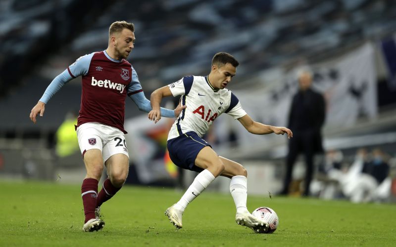 Sergio Reguilon of Tottenham Hotspur is challenged by Jarrod Bowen of West Ham