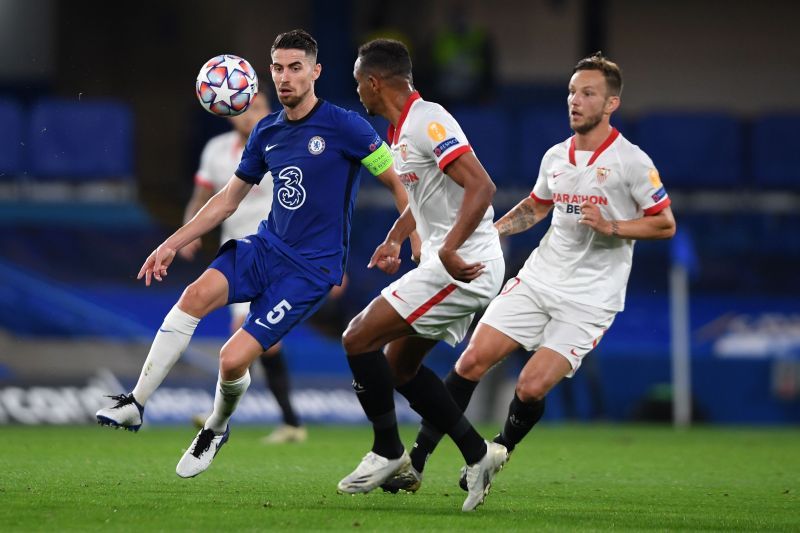 Jorginho tries to wrestle away from Fernando and Ivan Rakitic in the first half