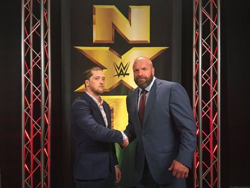 Kyle O'Reilly with Triple H in WWE NXT