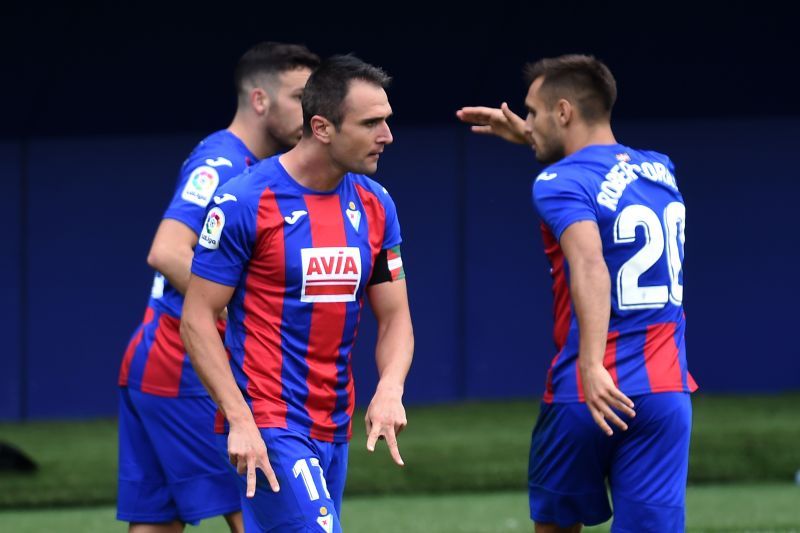 SD Eibar striker Kike Garcia celebrates with teammates