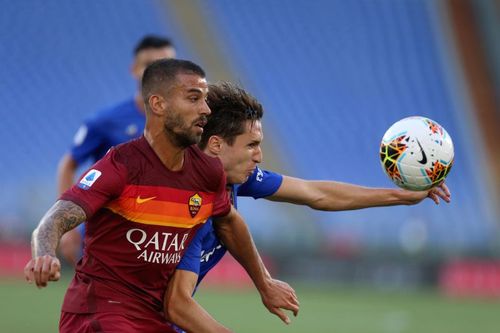 AS Roma take on Fiorentina in Serie A action