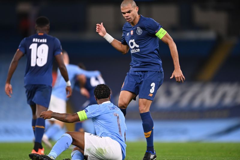 Porto&#039;s Pepe fouls Manchester City&#039;s Raheem Sterling to give away a penalty to the home side.