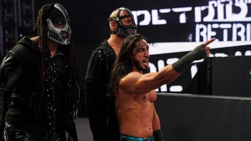 Did Mustafa Ali suddenly just become a member of RETRIBUTION?